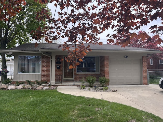 4139 Yorba Linda Blvd, Royal Oak, MI 48073 - view of front of home with driveway, brick siding, and a garage
