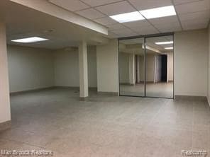 4139 Yorba Linda Blvd, Royal Oak, MI 48073 - finished below grade area with a drop ceiling and baseboards