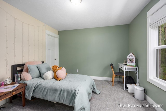 9012 N Wolven Ridge Ct, Rockford, MI 49341 - carpeted bedroom with baseboards