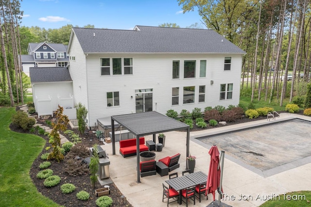 9012 N Wolven Ridge Ct, Rockford, MI 49341 - rear view of house with outdoor lounge area, a patio, a shingled roof, and a gazebo