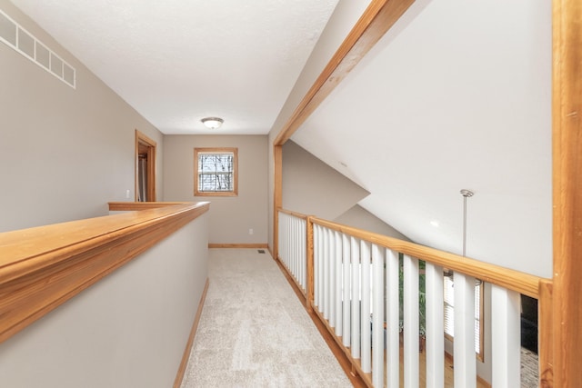 6833 Strawberry Lake Rd, Whitmore Lake, MI 48189 - hall featuring light carpet and baseboards