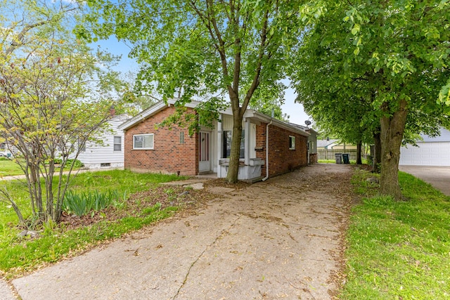 80 E Mahan Ave, Hazel Park, MI 48030 - view of front of house featuring concrete driveway and brick siding