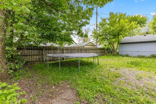 80 E Mahan Ave, Hazel Park, MI 48030 - fenced backyard featuring a trampoline