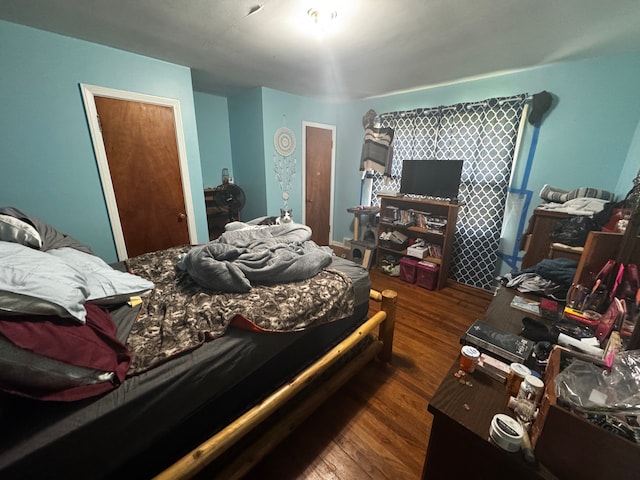 563 Walnut St, Mount Morris, MI 48458 - bedroom with wood finished floors
