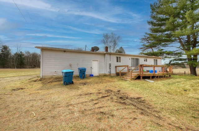 4650 Waltan Rd, Vassar, MI 48768 - back of property featuring a wooden deck and a yard