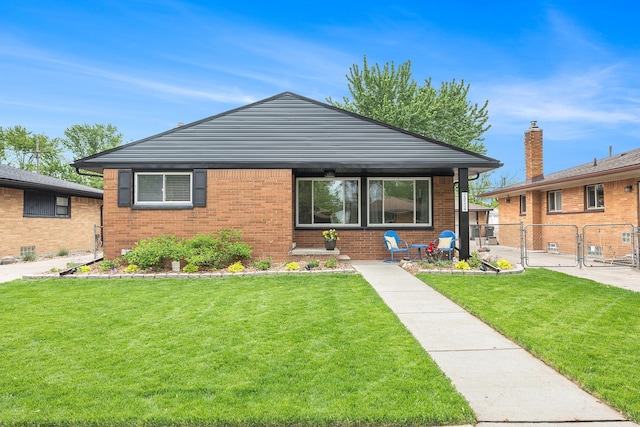 24504 Princeton St, Saint Clair Shores, MI 48080 - bungalow-style home with brick siding and a gate