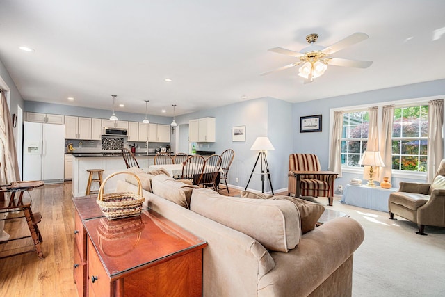 925 Plym Rd, Niles, MI 49120 - living area featuring a ceiling fan, recessed lighting, baseboards, and light wood-type flooring