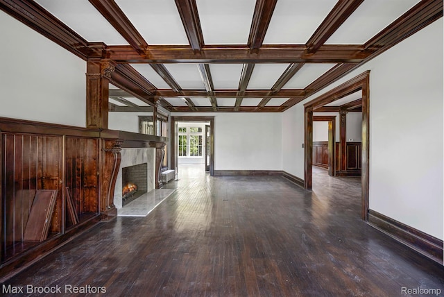94 E Boston Blvd, Detroit, MI 48202 - unfurnished living room with wood finished floors, coffered ceiling, a high end fireplace, and beam ceiling