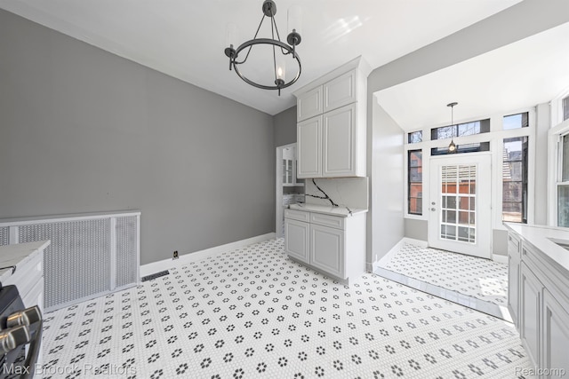 94 E Boston Blvd, Detroit, MI 48202 - washroom with a chandelier and radiator heating unit