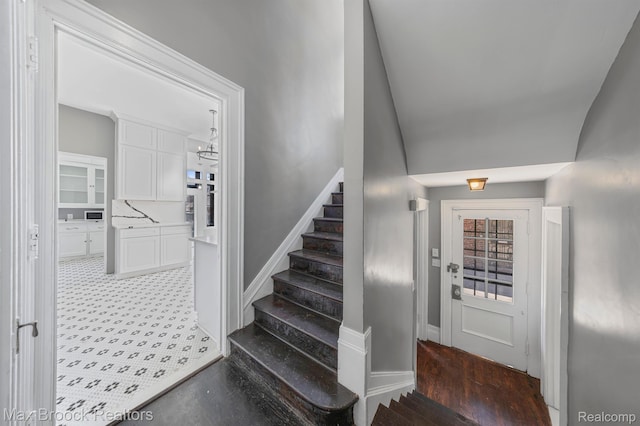 94 E Boston Blvd, Detroit, MI 48202 - stairs with wood finished floors and vaulted ceiling