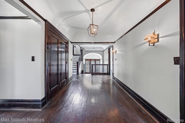 94 E Boston Blvd, Detroit, MI 48202 - corridor featuring wood-type flooring, a chandelier, and stairs