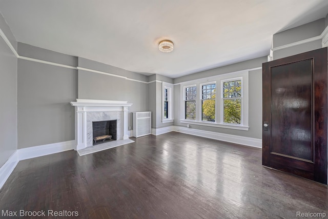 94 E Boston Blvd, Detroit, MI 48202 - unfurnished living room with a high end fireplace and wood finished floors