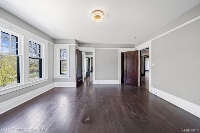 94 E Boston Blvd, Detroit, MI 48202 - unfurnished living room with dark wood-style flooring