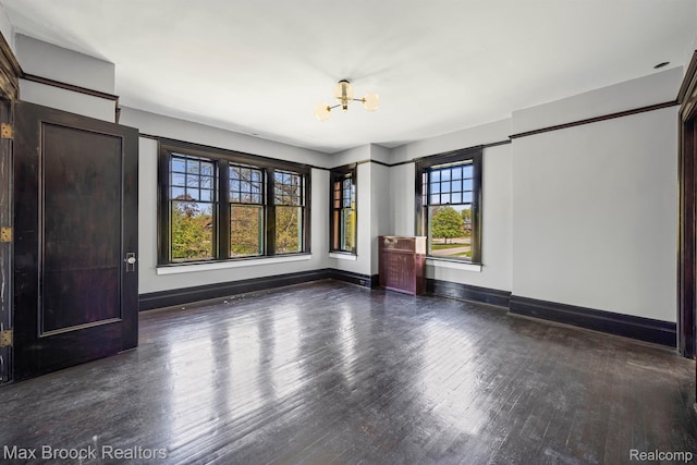 94 E Boston Blvd, Detroit, MI 48202 - unfurnished room with a chandelier and wood finished floors