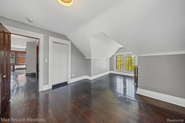 94 E Boston Blvd, Detroit, MI 48202 - additional living space with dark wood-type flooring and vaulted ceiling