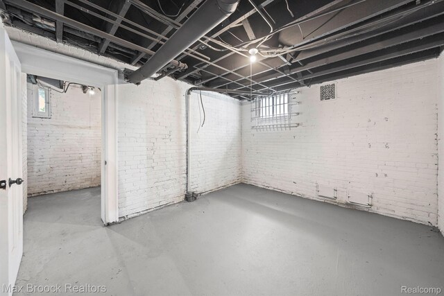 94 E Boston Blvd, Detroit, MI 48202 - basement featuring brick wall and plenty of natural light