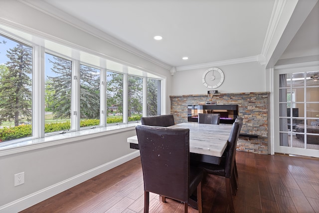 1533 Walton Blvd, Rochester Hills, MI 48309 - dining space with dark wood-style flooring, baseboards, crown molding, a stone fireplace, and recessed lighting