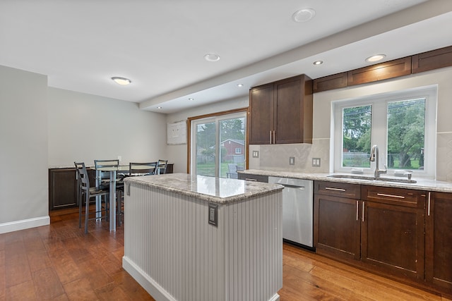 1533 Walton Blvd, Rochester Hills, MI 48309 - kitchen with dishwasher, a sink, hardwood / wood-style floors, light stone countertops, and dark brown cabinetry
