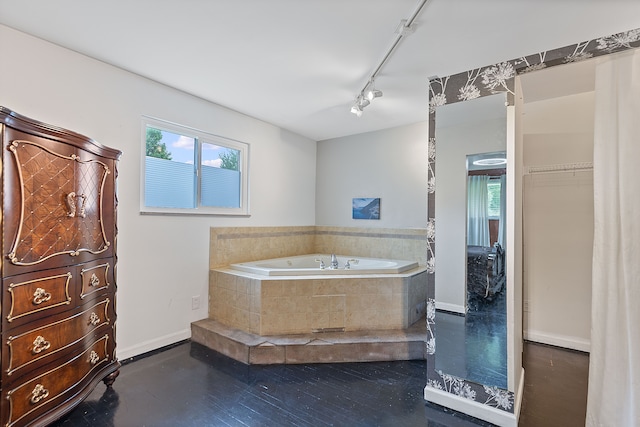 1533 Walton Blvd, Rochester Hills, MI 48309 - bathroom with a garden tub, plenty of natural light, baseboards, and rail lighting