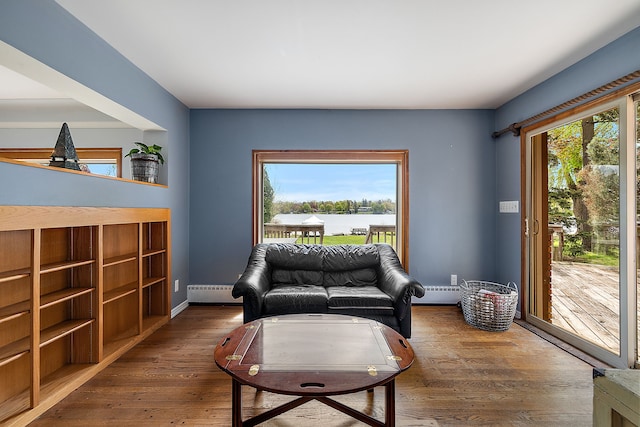 6351 Alden Dr, West Bloomfield, MI 48324 - living area with baseboard heating, hardwood / wood-style floors, and baseboards