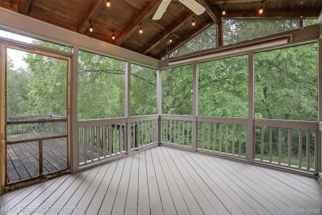5844 Independence Ln, West Bloomfield, MI 48322 - unfurnished sunroom with lofted ceiling, a ceiling fan, and a forest view