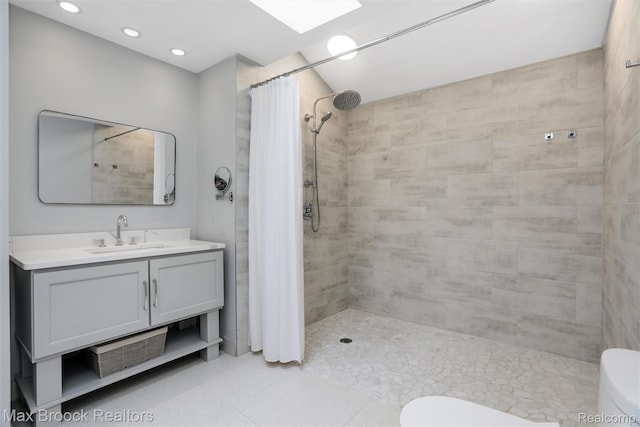 5844 Independence Ln, West Bloomfield, MI 48322 - full bath with toilet, a tile shower, vanity, and recessed lighting