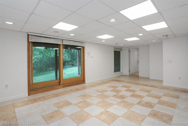 5844 Independence Ln, West Bloomfield, MI 48322 - unfurnished room with a paneled ceiling and baseboards