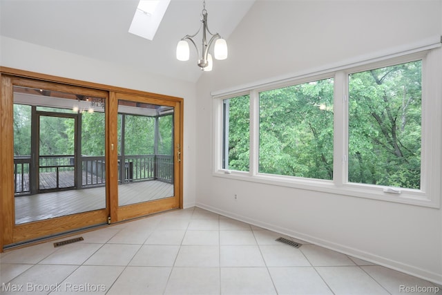 5844 Independence Ln, West Bloomfield, MI 48322 - unfurnished room with a skylight, lofted ceiling, a chandelier, light tile patterned flooring, and baseboards