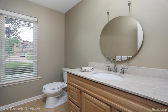 5844 Independence Ln, West Bloomfield, MI 48322 - half bath featuring vanity, toilet, tile patterned floors, and baseboards
