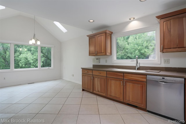 5844 Independence Ln, West Bloomfield, MI 48322 - kitchen featuring dishwasher, a skylight, a sink, brown cabinetry, and vaulted ceiling