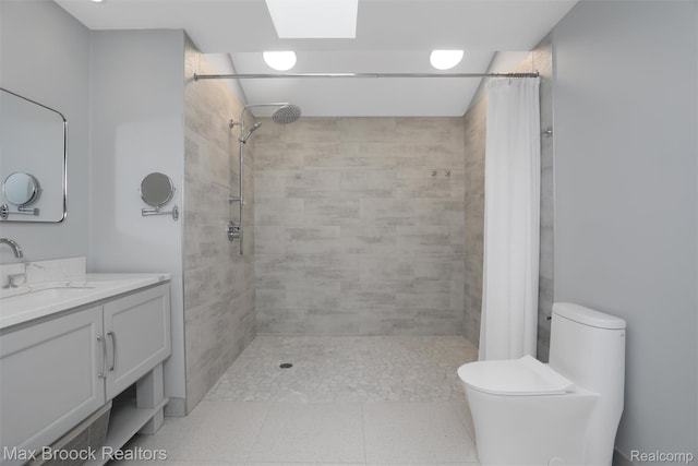 5844 Independence Ln, West Bloomfield, MI 48322 - bathroom featuring toilet, vanity, and tiled shower
