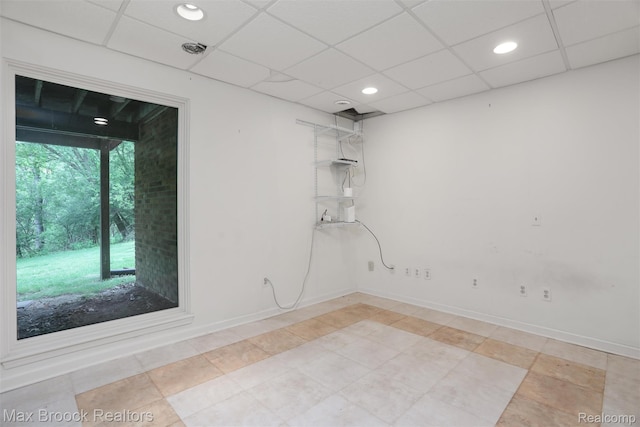 5844 Independence Ln, West Bloomfield, MI 48322 - empty room with light tile patterned floors, recessed lighting, baseboards, and a drop ceiling