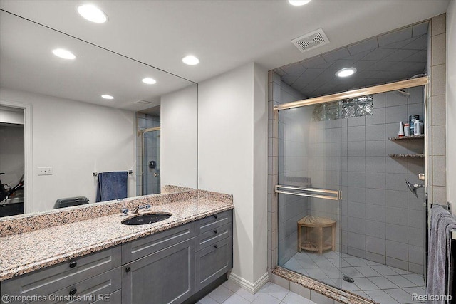 4889 Ardmore Dr, Bloomfield Hills, MI 48302 - bathroom with recessed lighting, a stall shower, vanity, and tile patterned floors