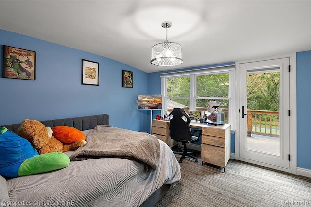 4889 Ardmore Dr, Bloomfield Hills, MI 48302 - bedroom with access to exterior, vaulted ceiling, a chandelier, an office area, and carpet
