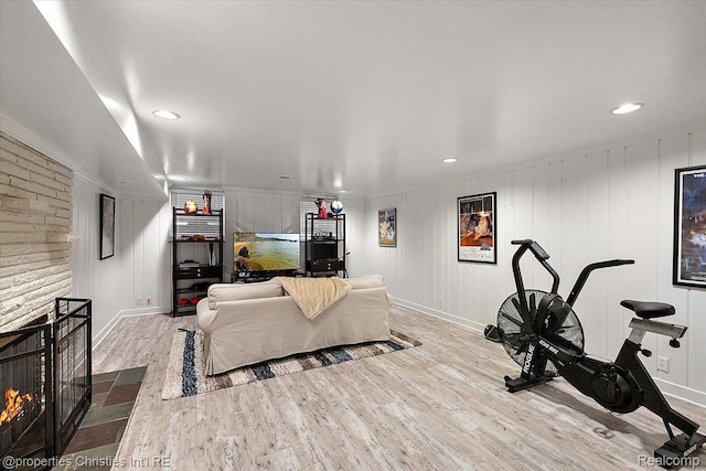 4889 Ardmore Dr, Bloomfield Hills, MI 48302 - living room with wood finished floors, baseboards, recessed lighting, and a fireplace with flush hearth
