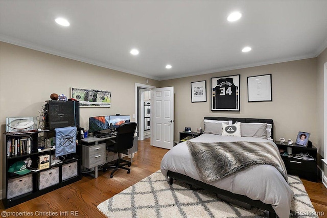 4889 Ardmore Dr, Bloomfield Hills, MI 48302 - bedroom featuring crown molding, recessed lighting, wood finished floors, and an office area