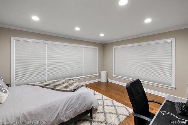 4889 Ardmore Dr, Bloomfield Hills, MI 48302 - bedroom featuring crown molding, wood finished floors, recessed lighting, baseboards, and an office area