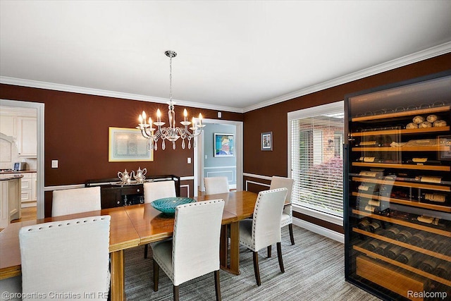 4889 Ardmore Dr, Bloomfield Hills, MI 48302 - dining room with a chandelier, ornamental molding, and baseboards