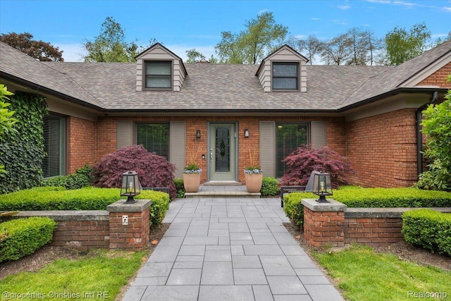 4889 Ardmore Dr, Bloomfield Hills, MI 48302 - view of front facade featuring brick siding and a shingled roof