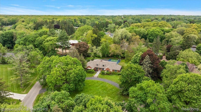 4889 Ardmore Dr, Bloomfield Hills, MI 48302 - aerial view of property and surrounding area with a forest