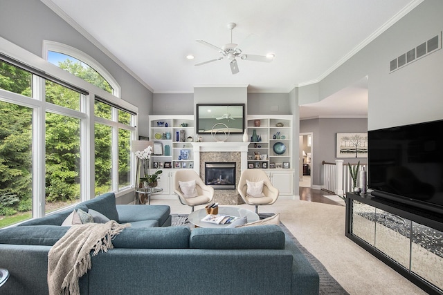6371 Colorado Ct, Norton Shores, MI 49441 - living room with ceiling fan, a high end fireplace, crown molding, and recessed lighting