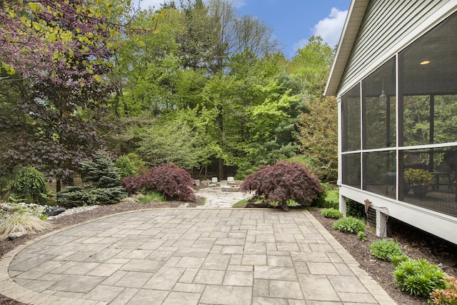 6371 Colorado Ct, Norton Shores, MI 49441 - view of patio / terrace featuring a sunroom