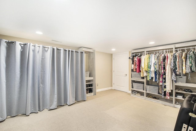 6371 Colorado Ct, Norton Shores, MI 49441 - walk in closet featuring carpet floors