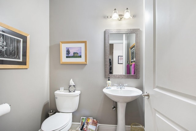 6371 Colorado Ct, Norton Shores, MI 49441 - bathroom with toilet and a sink