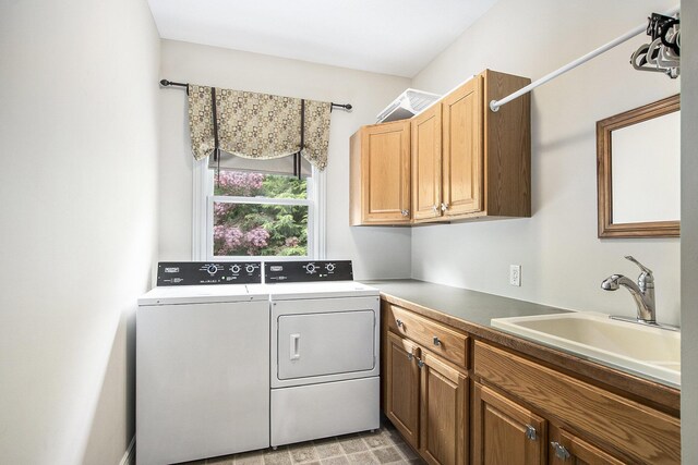 6371 Colorado Ct, Norton Shores, MI 49441 - laundry area featuring washer and dryer and cabinet space
