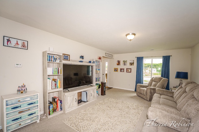 4240 Butternut Dr, Wayland, MI 49348 - carpeted living area with baseboards
