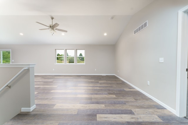 9674 Iosco Ridge Dr, Gregory, MI 48137 - unfurnished room featuring plenty of natural light, a ceiling fan, lofted ceiling, wood finished floors, and recessed lighting