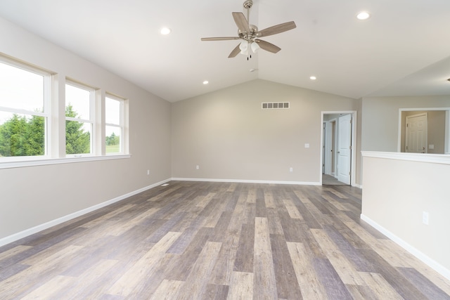 9674 Iosco Ridge Dr, Gregory, MI 48137 - empty room featuring ceiling fan, lofted ceiling, baseboards, recessed lighting, and wood finished floors