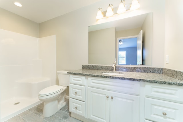 9674 Iosco Ridge Dr, Gregory, MI 48137 - full bath with a ceiling fan, toilet, a shower, and vanity