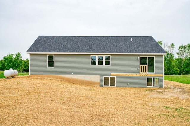 9674 Iosco Ridge Dr, Gregory, MI 48137 - back of house featuring a shingled roof